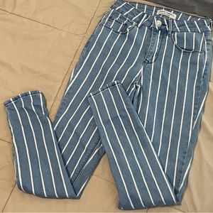 Almost Famous high-rise stripped skinny jeans! Size 1!
